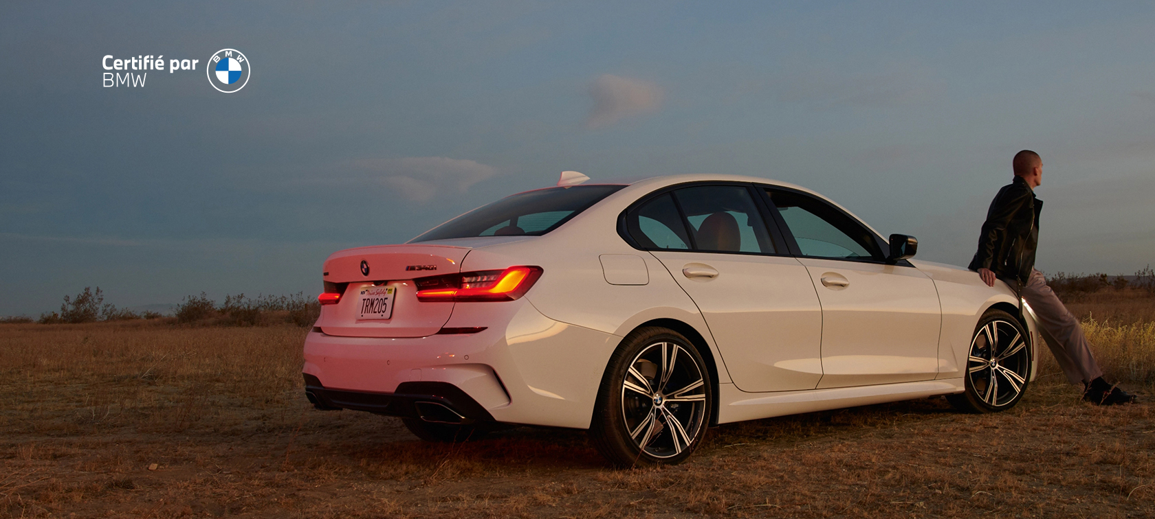 Man sitting on BMW